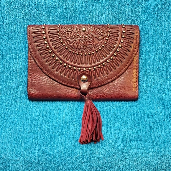 Patricia Nash distressed burgundy leather clutch